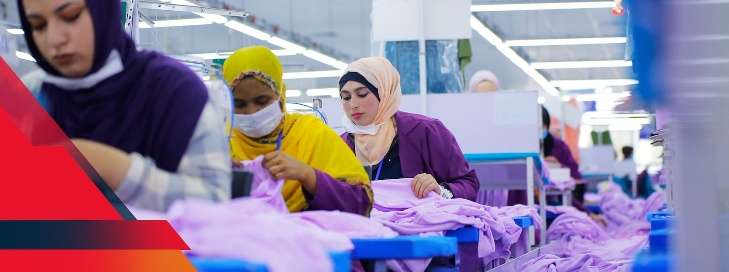 Workers at a factory pictured on Classic Fashion Apparel's website. www.classicfashionapparel.com