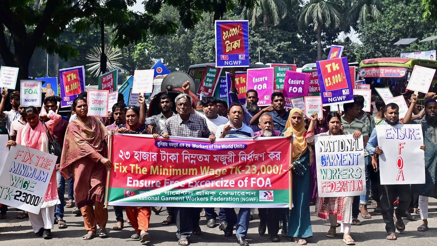 Garment workers take part in a protest to demand an increase in Bangladesh's minimum wage earlier this month.