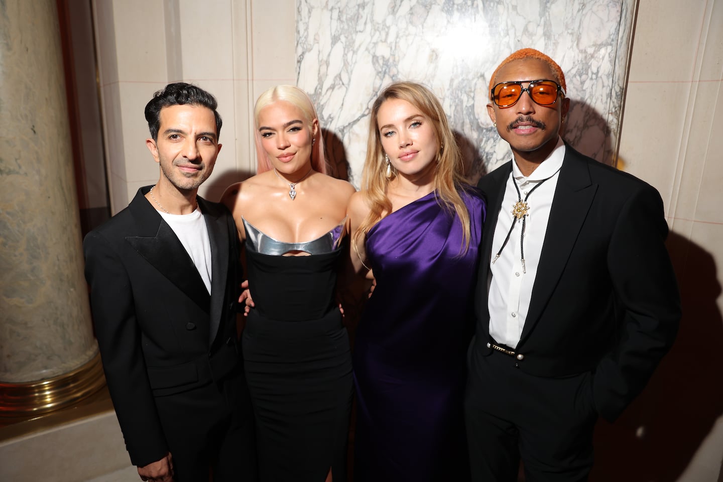 (L-R) Imran Amed, Karol G, Isamaya Ffrench and Pharrell Williams attends the #BoF500 Gala during Paris Fashion Week at Shangri-La Hotel Paris on September 30, 2023 in Paris, France.