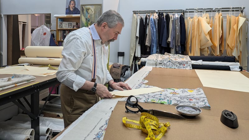 Phillip Sawyer crafting garments in his atelier.