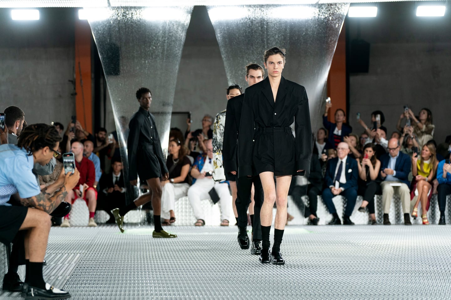 Models walk the runway at the Prada Spring/Summer 2024 menswear show.
