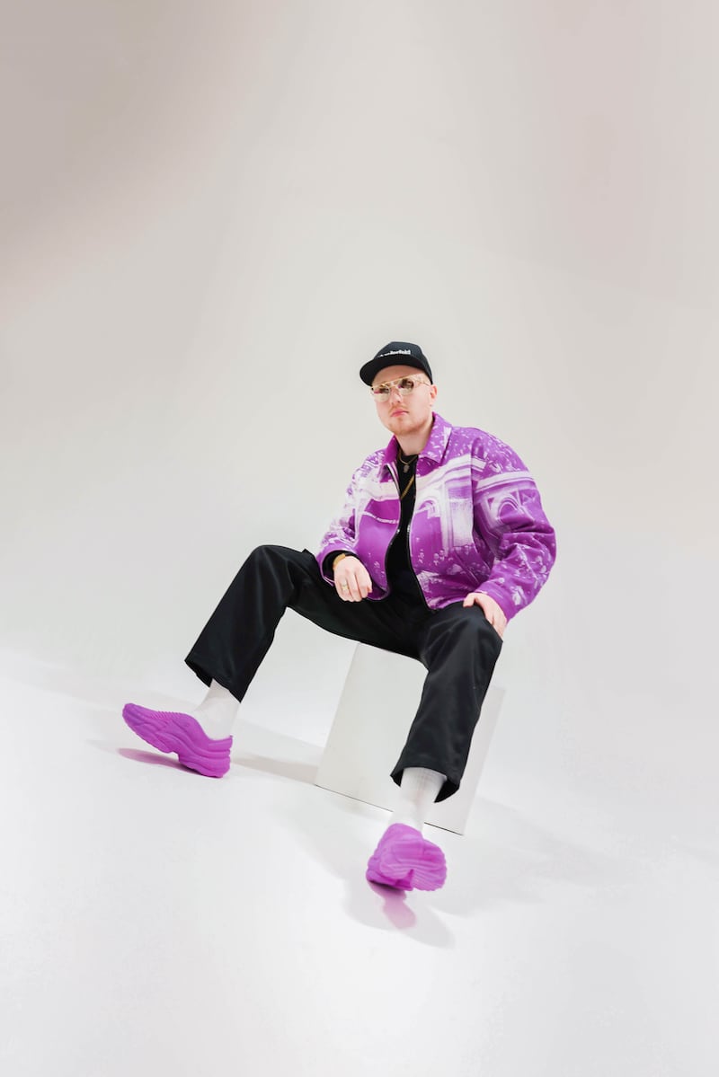 A portrait of Cornelius Schmitt wearing his 3D-printed footwear.