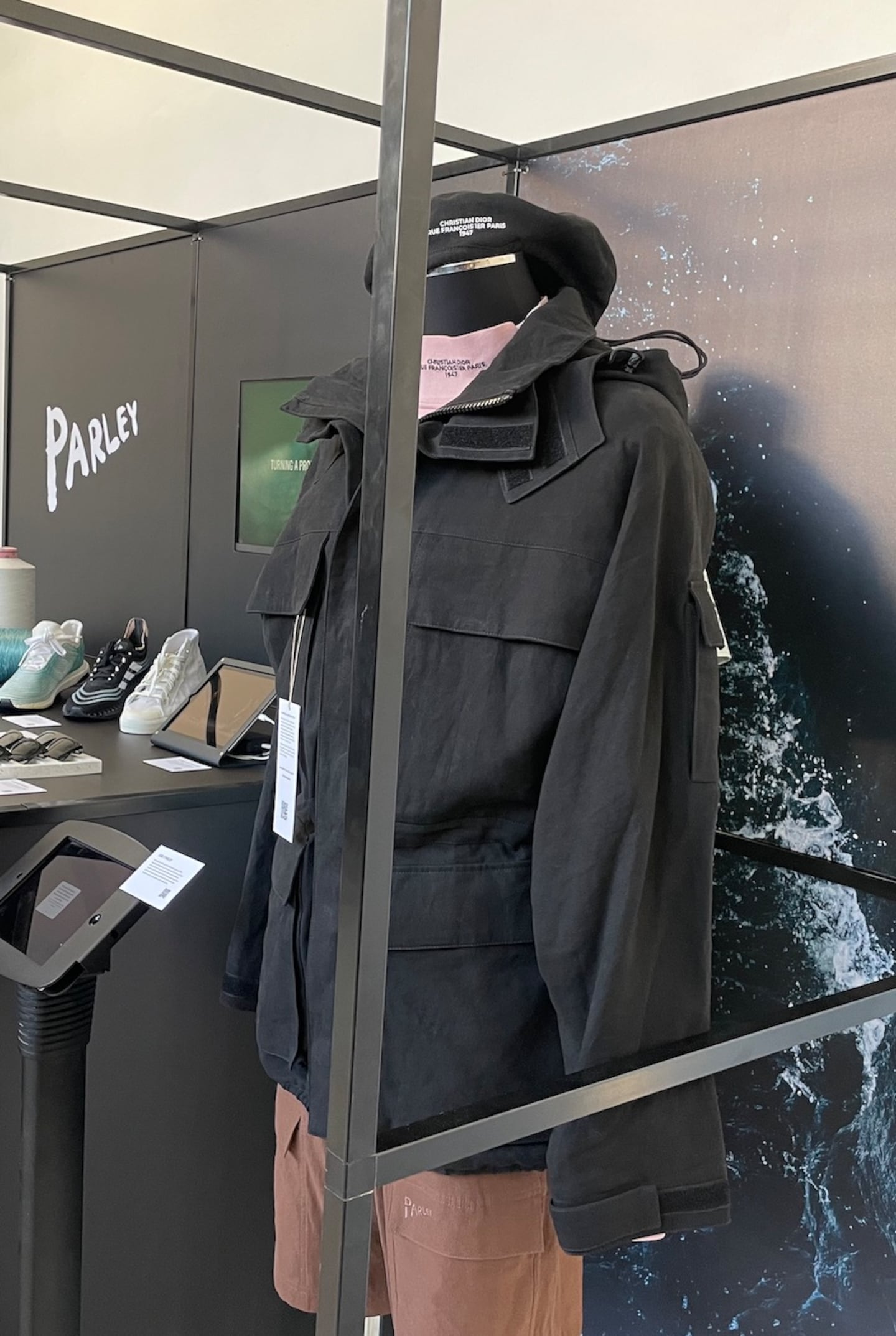A black jacket made by Dior using Bananatex on display at a Parley booth at the Biofabricate conference in Paris.