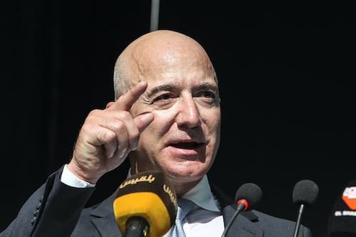 Amazon Critics Protest Outside of Jeff Bezos' Home for Cyber Monday
