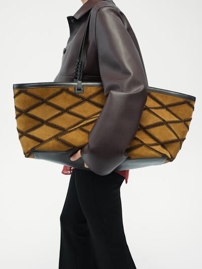 Métier's suede and crochet patchwork tote for Spring 2026.