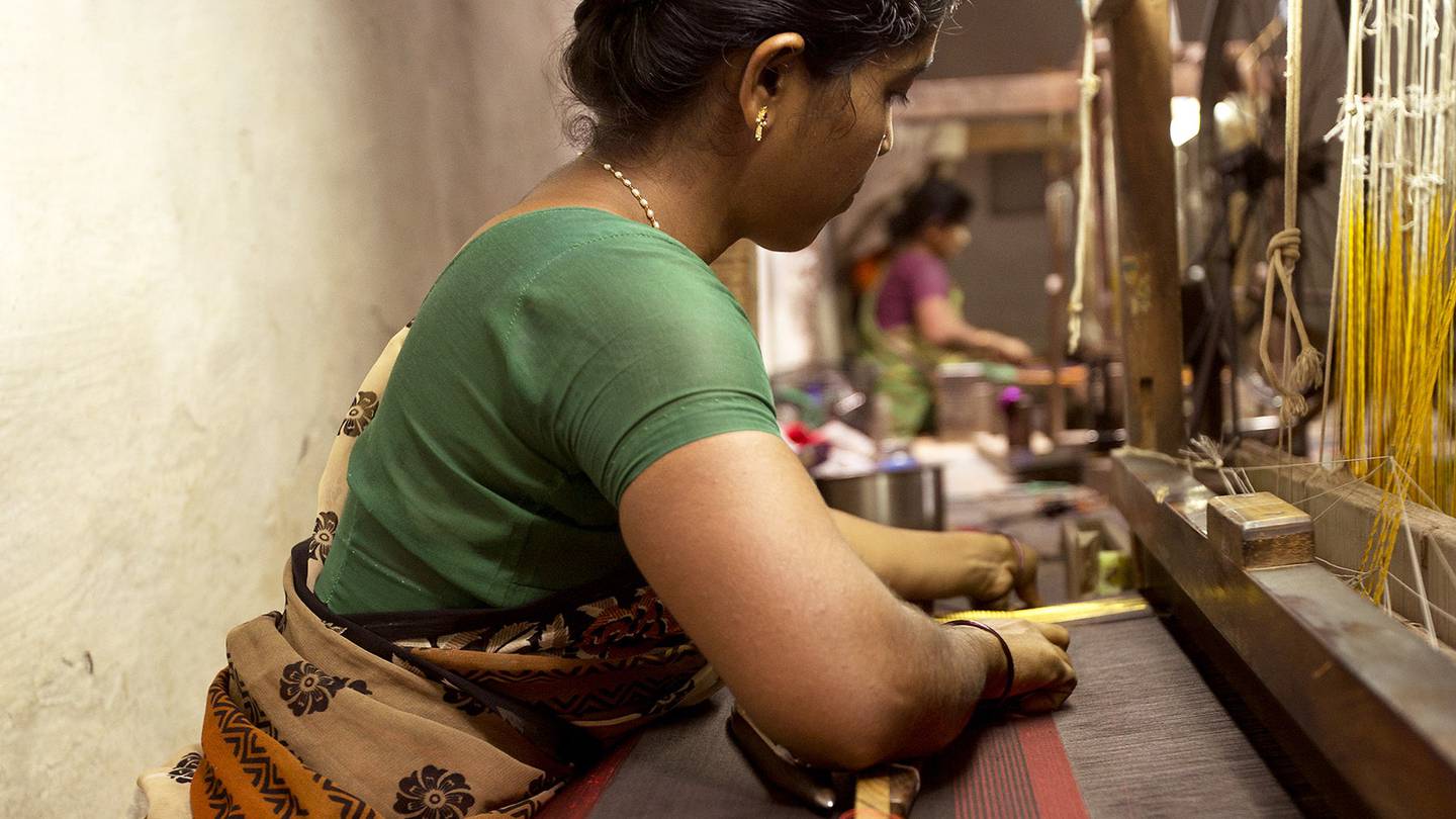 A weaver in India | Source: Shutterstock