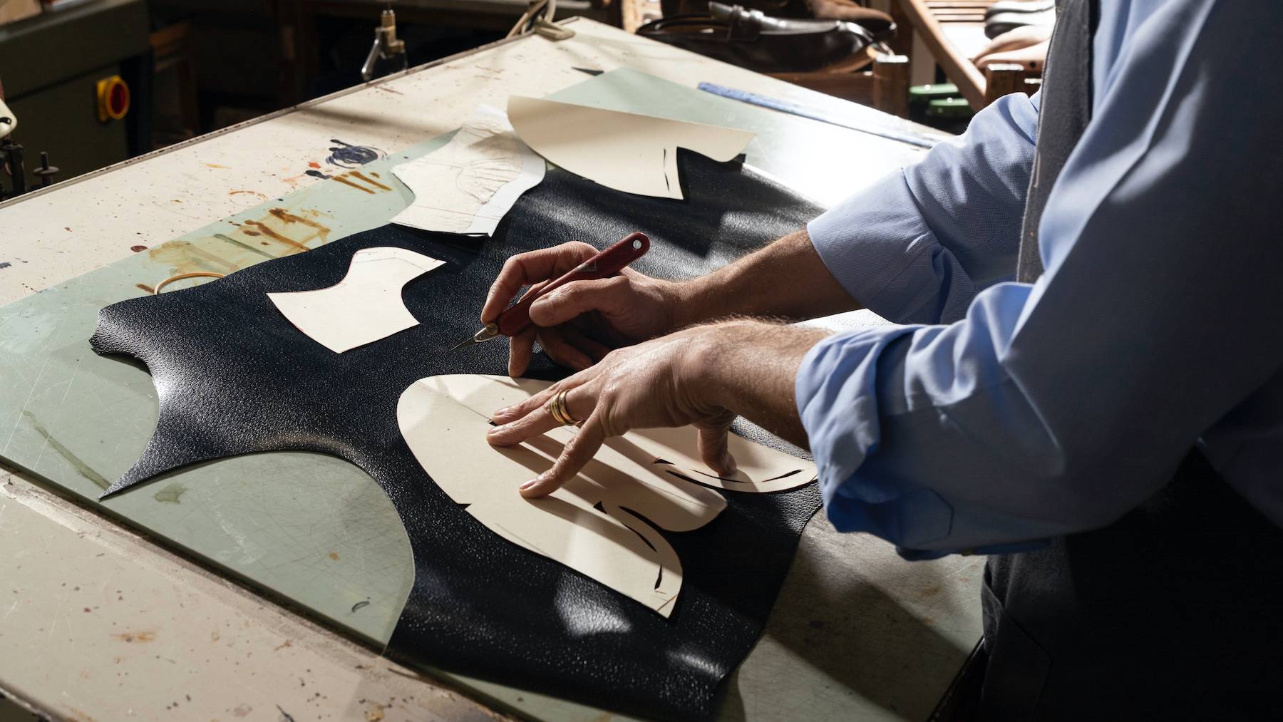Craftsperson working in an Italian shoe factory.