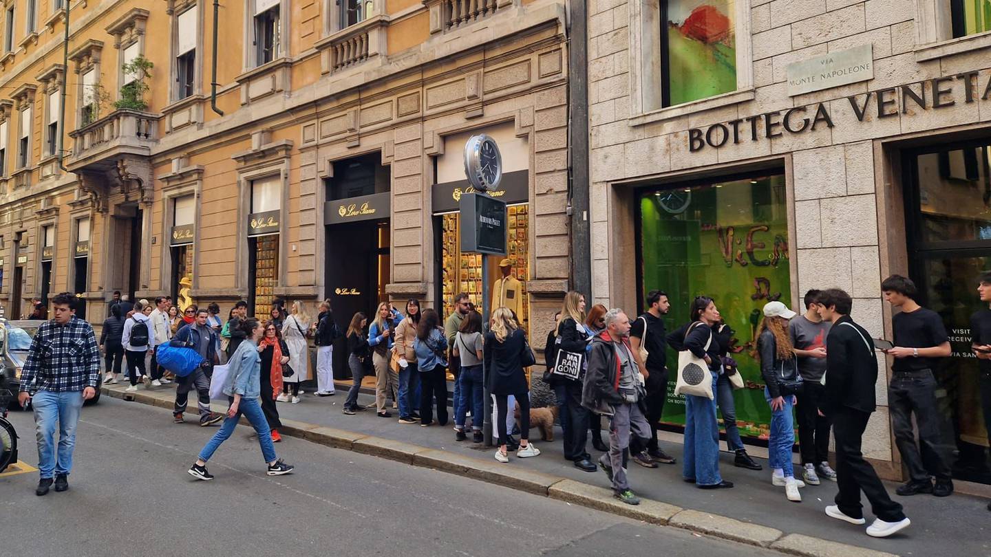Queues of people line the street outside the Bottega Veneta store in Milan during Salone del Mobile.