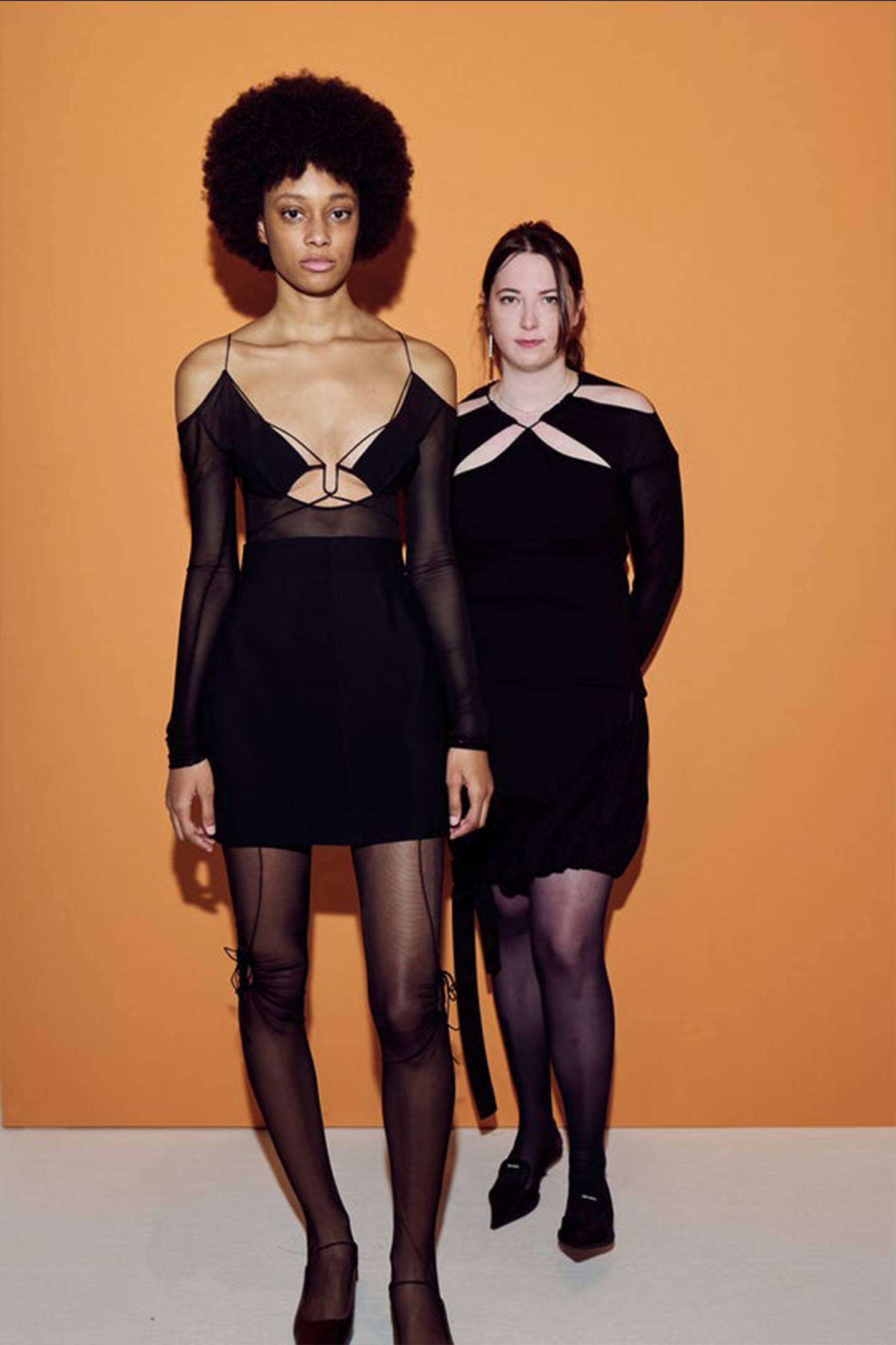 Nensi Dojaka, right, at the LVMH Prize event alongside a model sporting her Autumn/Winter 2021 collection. LVMH.